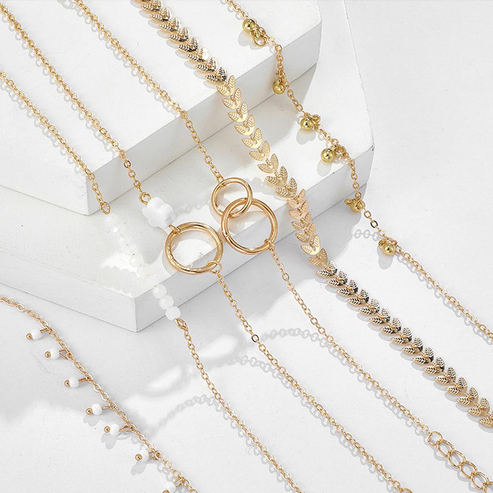 Set di Braccialetti Boho Dorati
