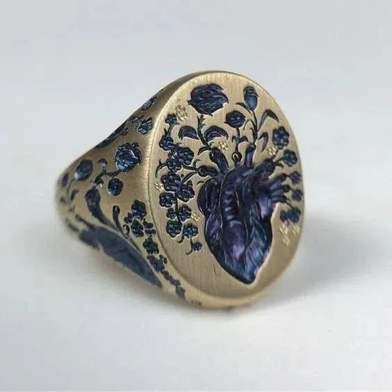 Anello dorato vintage con fiore blu