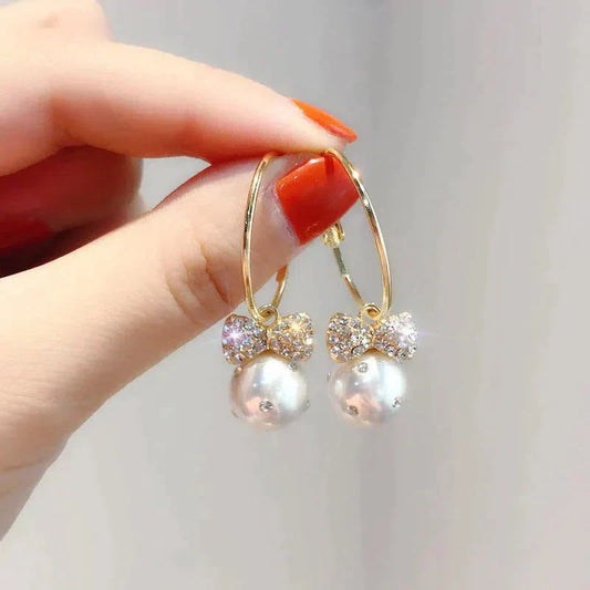 Shiny Gold Earrings with Pearls