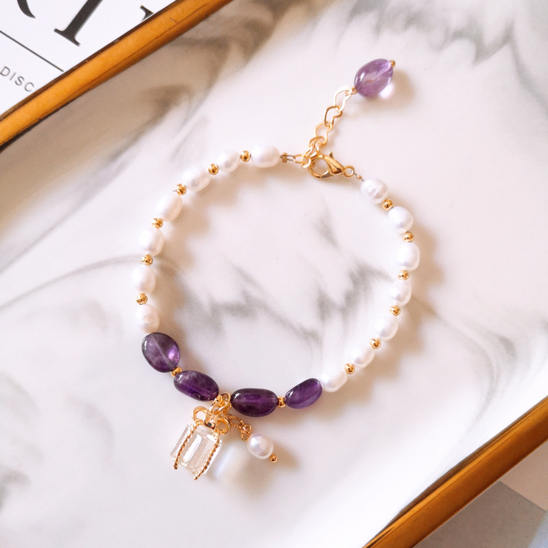 Bracciale con Pietre Viola e Perle in Oro